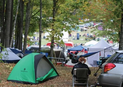 Camping in the woods and chilling to the music at the festival in Starks, Maine