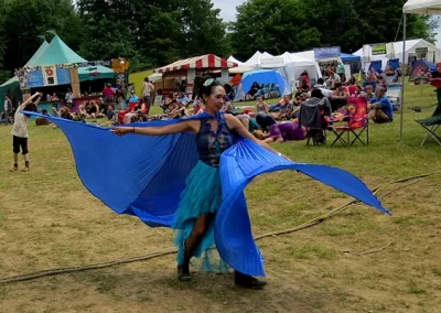 Twirling in blue dancing in the field