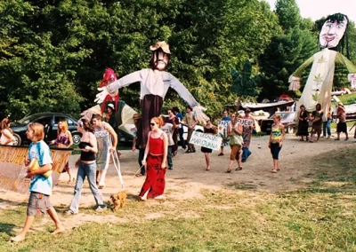 Puppets parading down The Hill