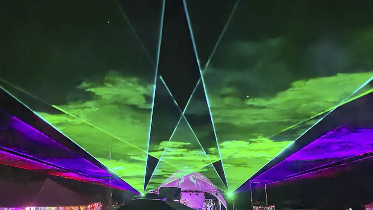 laser-show-on-Harrys-Hill Laser light show at The Happening 2025 by Cam Derr and Nocturnal Productions at Harry Brown’s Farm, Maine